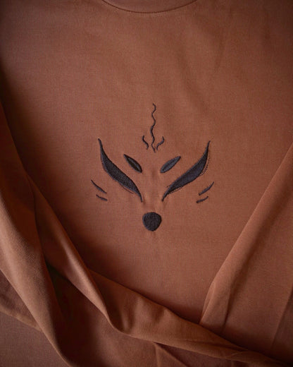 Embroidered Kitsune long-sleeve  close-up of front detailing