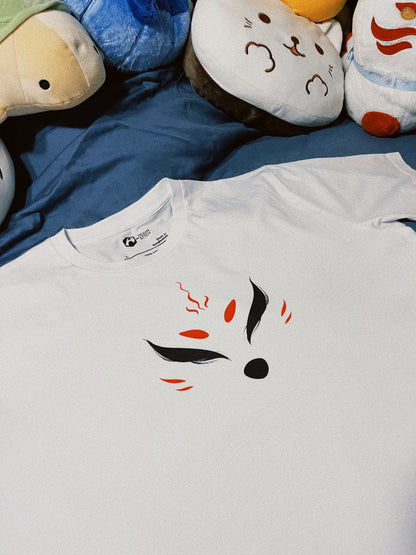 Close-up of a premium white cotton T-shirt featuring black and red markings of a kitsune
