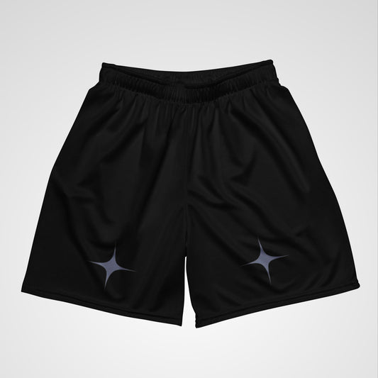 Top down view of long black athletic shorts featuring a grey-purple star on a light grey background