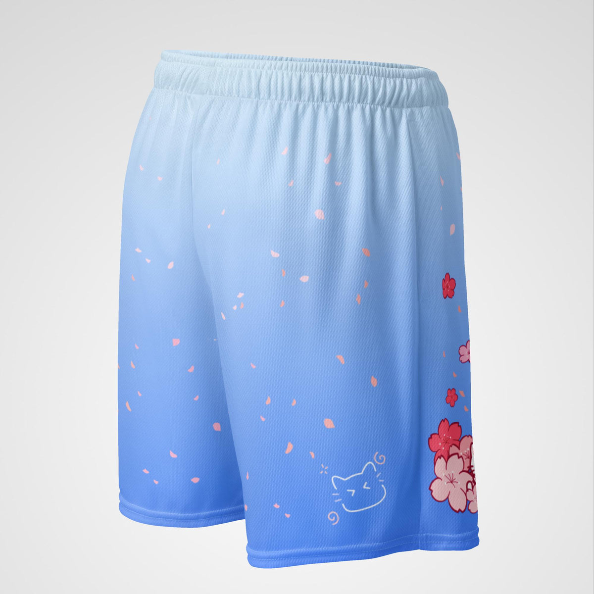 Rear view of blue shorts with floral and cat designs on a light gray background